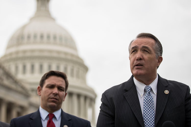 WASHINGTON, DC - MAY 22: (L to R) U.S. Rep. Randy Weber (R-TX) and Rep. Ron DeSantis (R-FL) look on as Rep. Trent Franks (R-AZ) speaks as he leads a press conference with fellow members of the House GOP on Capitol Hill, May 22, 2017 in Washington, DC. Franks led the group that discussed President Donald Trump's first overseas trip. (Photo by Drew Angerer/Getty Images)